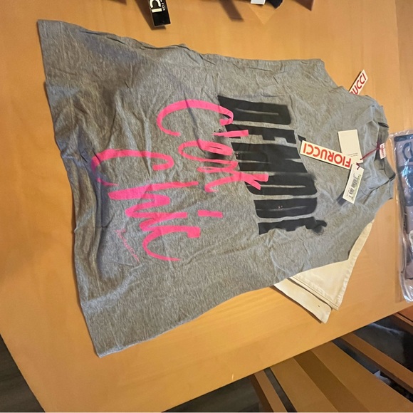 Various fiorucci jeanss, jackets, tshirts.  Various sizes
Naomi campbell - Picture 7 of 16